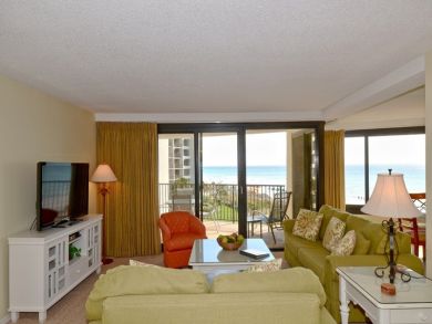 Living room open to pool